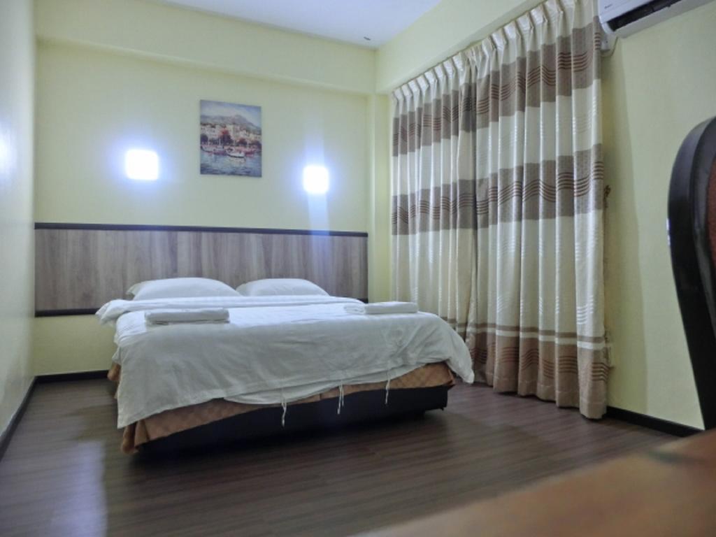 The Garden Inn Miri Kamer foto